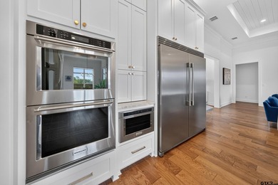 Tucked away within Maple Leaf off Legacy Bend sits a luxurious - photo 15