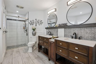 Welcome to elevated lake living, nestled within the sought-after - photo 21