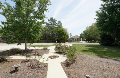 Lovely four-bedroom home situated on a spacious lot in the - photo 6