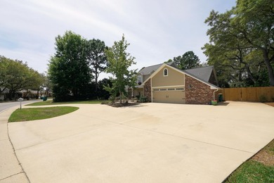 Lovely four-bedroom home situated on a spacious lot in the - photo 8