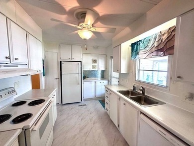 This beautifully maintained turnkey furnished home is situated - photo 7
