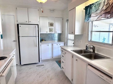 This beautifully maintained turnkey furnished home is situated - photo 8