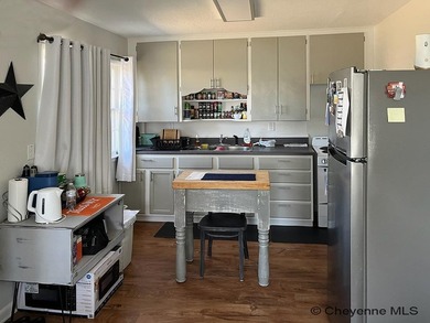 Charming and versatile! This updated and well-maintained duplex - photo 3