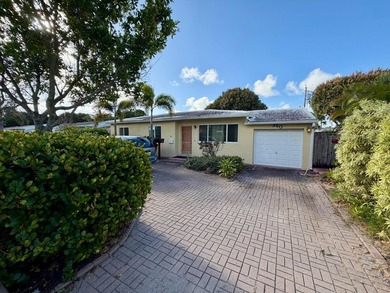Opportunity awaits in this solid CBS construction home in the - photo 1