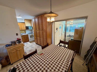 Opportunity awaits in this solid CBS construction home in the - photo 3