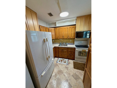 Opportunity awaits in this solid CBS construction home in the - photo 4