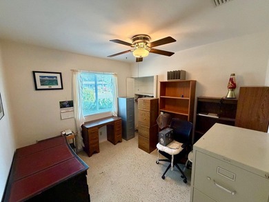 Opportunity awaits in this solid CBS construction home in the - photo 6