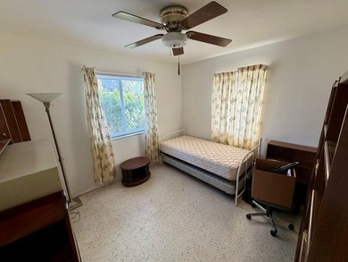 Opportunity awaits in this solid CBS construction home in the - photo 7