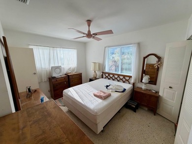 Opportunity awaits in this solid CBS construction home in the - photo 8
