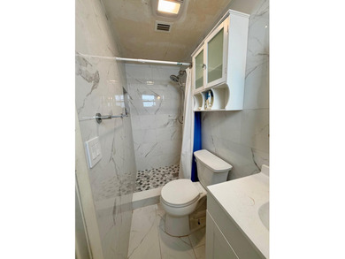 Opportunity awaits in this solid CBS construction home in the - photo 9