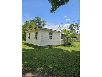 FIXER-UPPER WITH EXTRA LOT! Calling all families, investors, and - photo 2