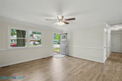 Outstanding HGTV brick rancher! Oversized attached garage! Open - photo 8