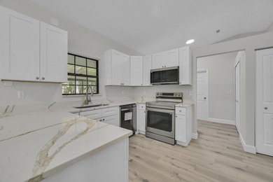Welcome home to this beautifully remodeled residence nestled in - photo 11