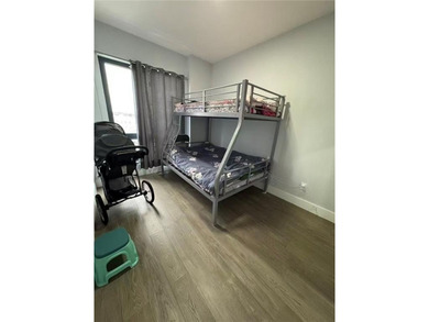 Discover modern luxury at 811 45th Street. This 5th-floor 2-bed - photo 5
