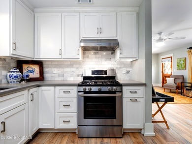 Embrace casual beach town living in this beautifully renovated - photo 5