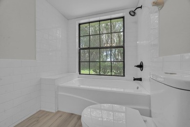 Welcome home to this beautifully remodeled residence nestled in - photo 26