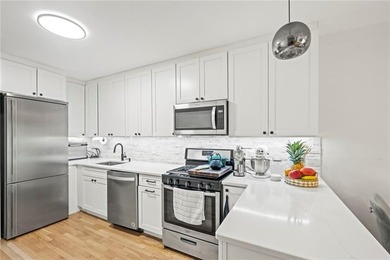 This stunning 3 bedroom, 1 1/2 bath condo with a covered parking - photo 9