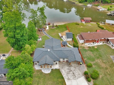 Lakefront Living! Experience serene lakefront living in this - photo 2