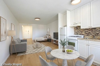Sun-Splashed High-Floor Retreat: Pristine Studio Co-op in - photo 7