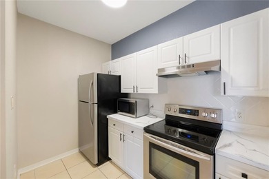 Welcome to quiet condo living at the Enclave at Richmond Place - photo 3