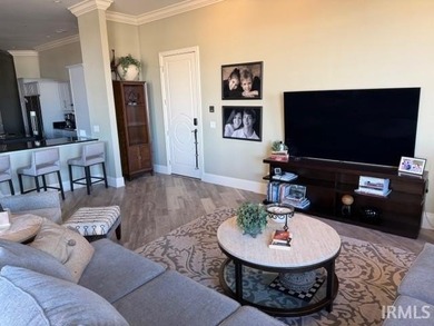 Experience refined urban living in this top-floor corner condo