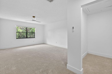ABSOLUTELY STUNNING FULLY RENOVATED CONDO | BOCA LAGO COMMUNITY - photo 17