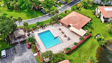 ABSOLUTELY STUNNING FULLY RENOVATED CONDO | BOCA LAGO COMMUNITY - photo 25