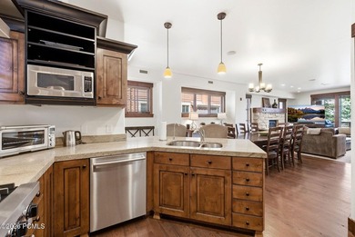 This 3-bedroom, 4-bathroom fully furnished end unit offers - photo 4