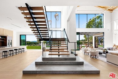 Completed in 2025, this stunning custom estate is sited in the - photo 11