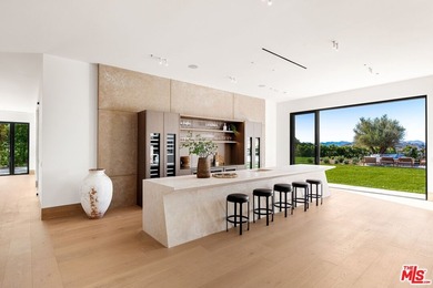 Completed in 2025, this stunning custom estate is sited in the - photo 12