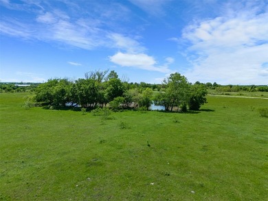 This 27.16-acre property, zoned for pre-development, offers a - photo 15