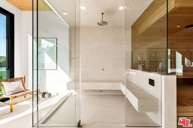 Completed in 2025, this stunning custom estate is sited in the - photo 16