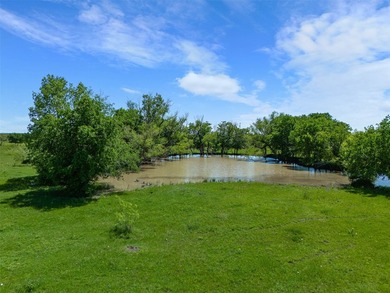 This 27.16-acre property, zoned for pre-development, offers a - photo 16