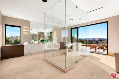 Completed in 2025, this stunning custom estate is sited in the - photo 20