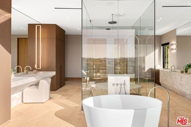 Completed in 2025, this stunning custom estate is sited in the - photo 21