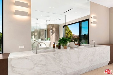 Completed in 2025, this stunning custom estate is sited in the - photo 22