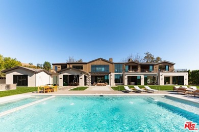 Completed in 2025, this stunning custom estate is sited in the - photo 25