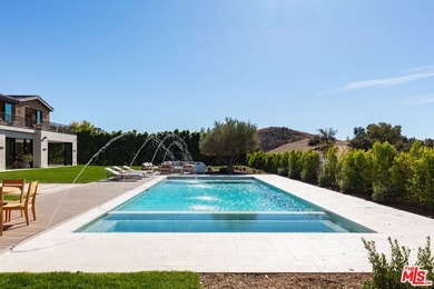 Completed in 2025, this stunning custom estate is sited in the - photo 26