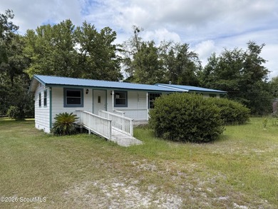 FIXER UPPER. The metal roof appears to be newer, and the - photo 1