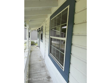 FIXER UPPER. The metal roof appears to be newer, and the - photo 4