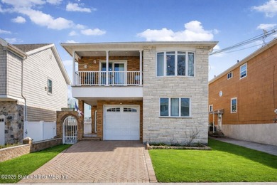 Welcome to this custom-built two-family detached home! This - photo 1