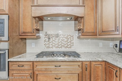 Welcome to this custom-built two-family detached home! This - photo 7