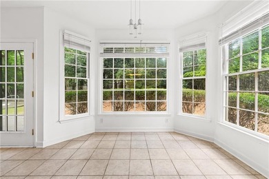 Welcome home to this beautifully maintained brick-front - photo 12