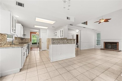 Welcome home to this beautifully maintained brick-front - photo 13