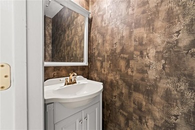 Welcome home to this beautifully maintained brick-front - photo 15