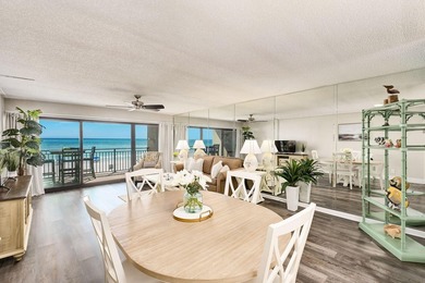 Wake up to stunning Gulf-front views in this charming - photo 2