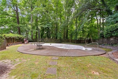 Welcome home to this beautifully maintained brick-front - photo 28