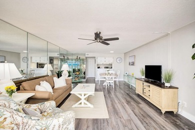 Wake up to stunning Gulf-front views in this charming - photo 9