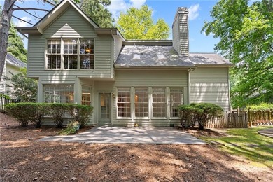 Welcome home to this beautifully maintained brick-front - photo 31