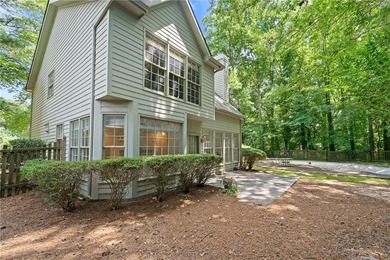Welcome home to this beautifully maintained brick-front - photo 32